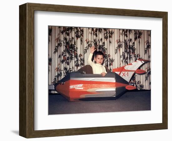 Young Boy Plays in a Cardboard Rocketship, Ca. 1956-null-Framed Photographic Print