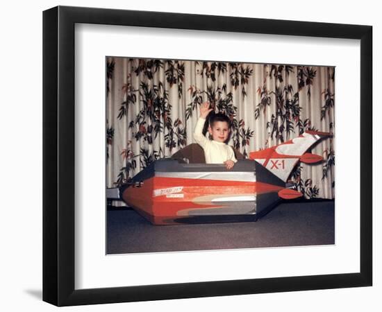 Young Boy Plays in a Cardboard Rocketship, Ca. 1956-null-Framed Photographic Print