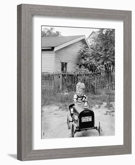 Young Boy Plays in His Backyard, Ca. 1929.-Kirn Vintage Stock-Framed Photographic Print