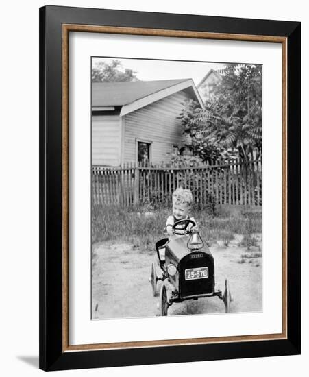Young Boy Plays in His Backyard, Ca. 1929.-Kirn Vintage Stock-Framed Photographic Print