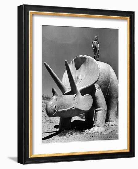 Young Boy Standing Atop Large Statue of Dinosaur in "Dinosaur Park" Tourist Attraction-Alfred Eisenstaedt-Framed Photographic Print