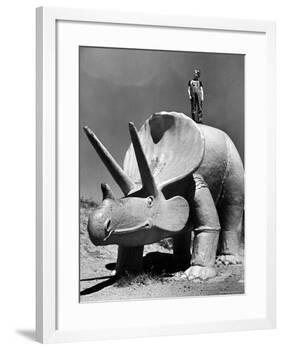 Young Boy Standing Atop Large Statue of Dinosaur in "Dinosaur Park" Tourist Attraction-Alfred Eisenstaedt-Framed Photographic Print