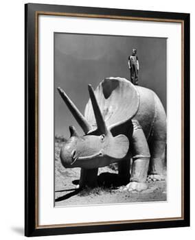 Young Boy Standing Atop Large Statue of Dinosaur in "Dinosaur Park" Tourist Attraction-Alfred Eisenstaedt-Framed Photographic Print