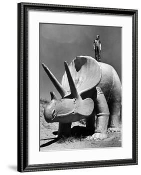 Young Boy Standing Atop Large Statue of Dinosaur in "Dinosaur Park" Tourist Attraction-Alfred Eisenstaedt-Framed Photographic Print
