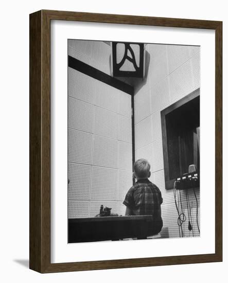 Young Boy Starring at the Loudspeaker Trying to Hear During a Medical Deafness Test-John Dominis-Framed Photographic Print