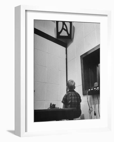 Young Boy Starring at the Loudspeaker Trying to Hear During a Medical Deafness Test-John Dominis-Framed Photographic Print