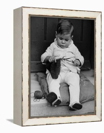 Young Boy Trying to Use Knitting Needles During Drive to Provide Woolen Goods for Servicemen-null-Framed Premier Image Canvas