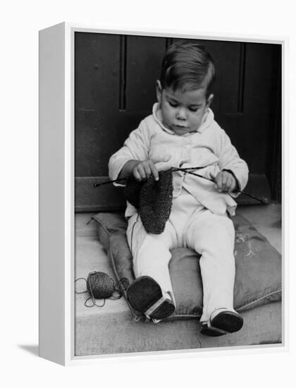 Young Boy Trying to Use Knitting Needles During Drive to Provide Woolen Goods for Servicemen-null-Framed Premier Image Canvas