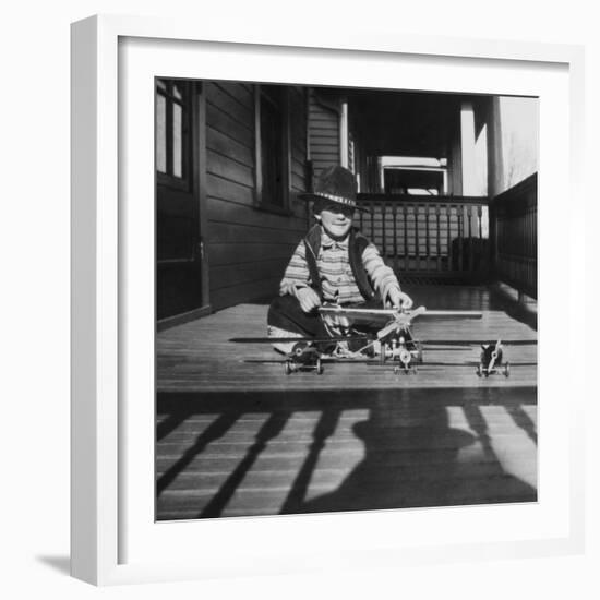 Young Boy with His Model Airplanes, Ca. 1932.-Kirn Vintage Stock-Framed Photographic Print