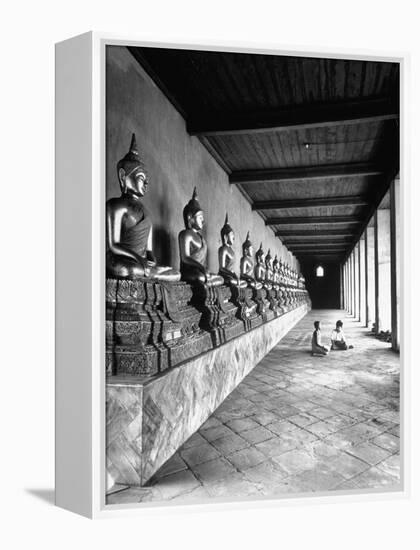 Young Buddhist and Boy on Inner Courtyard Near Buddhist Shrine-Dmitri Kessel-Framed Premier Image Canvas