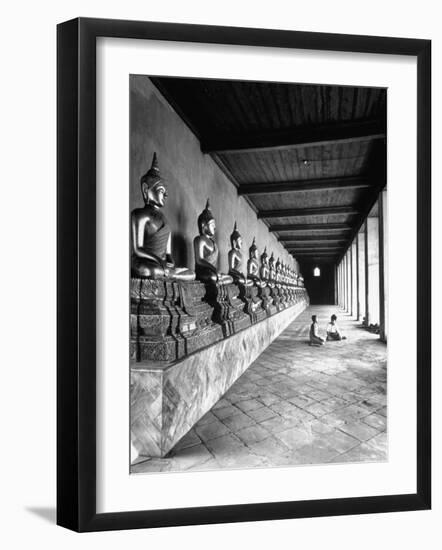 Young Buddhist and Boy on Inner Courtyard Near Buddhist Shrine-Dmitri Kessel-Framed Photographic Print