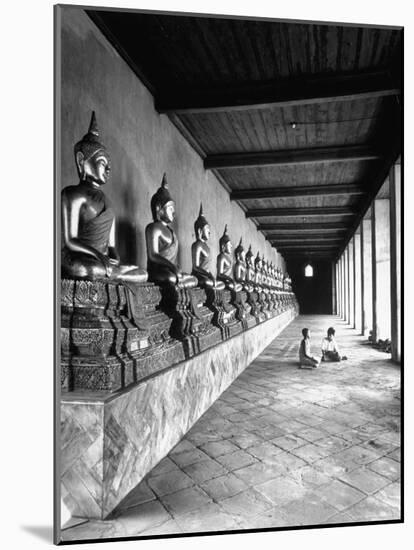 Young Buddhist and Boy on Inner Courtyard Near Buddhist Shrine-Dmitri Kessel-Mounted Photographic Print