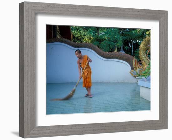 Young Buddhist Monk Sweeps Grounds at Wat Chaimong Khon Along Ping River at Sunset, Thailand-Paul Souders-Framed Photographic Print