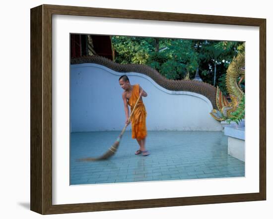 Young Buddhist Monk Sweeps Grounds at Wat Chaimong Khon Along Ping River at Sunset, Thailand-Paul Souders-Framed Photographic Print