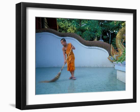 Young Buddhist Monk Sweeps Grounds at Wat Chaimong Khon Along Ping River at Sunset, Thailand-Paul Souders-Framed Photographic Print