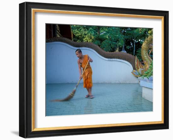 Young Buddhist Monk Sweeps Grounds at Wat Chaimong Khon Along Ping River at Sunset, Thailand-Paul Souders-Framed Photographic Print