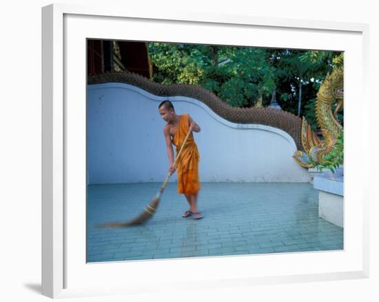 Young Buddhist Monk Sweeps Grounds at Wat Chaimong Khon Along Ping River at Sunset, Thailand-Paul Souders-Framed Photographic Print