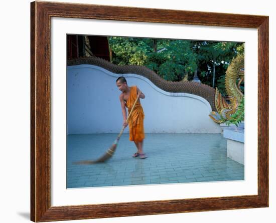 Young Buddhist Monk Sweeps Grounds at Wat Chaimong Khon Along Ping River at Sunset, Thailand-Paul Souders-Framed Photographic Print