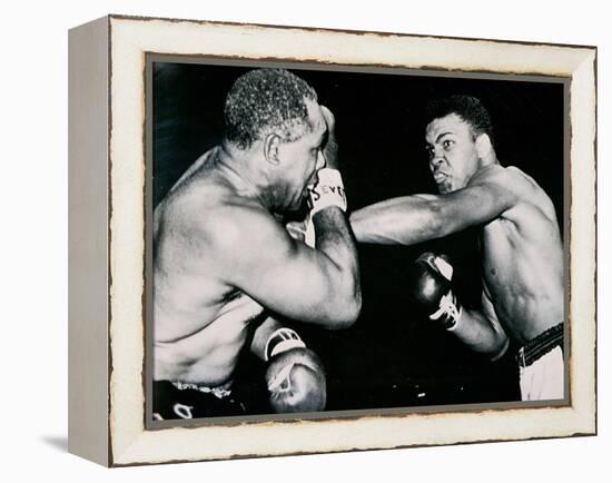 Young Cassius Clay Scores with a Left Against the Veteran Archie Moore in the First Round of the?-American Photographer-Framed Premier Image Canvas