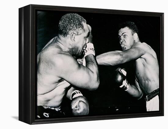 Young Cassius Clay Scores with a Left Against the Veteran Archie Moore in the First Round of the?-American Photographer-Framed Premier Image Canvas