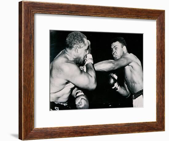 Young Cassius Clay Scores with a Left Against the Veteran Archie Moore in the First Round of the?-American Photographer-Framed Photographic Print