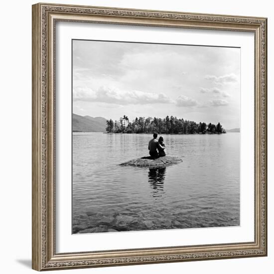 Young Couple Embracing on Small Rock Protruding from the Waters of Lake George-Nina Leen-Framed Photographic Print