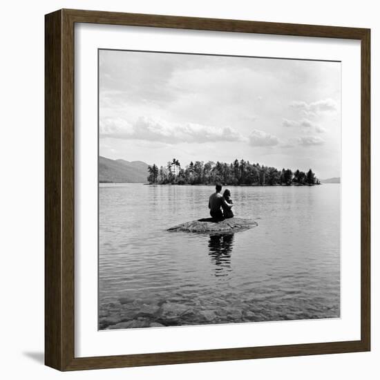 Young Couple Embracing on Small Rock Protruding from the Waters of Lake George-Nina Leen-Framed Photographic Print