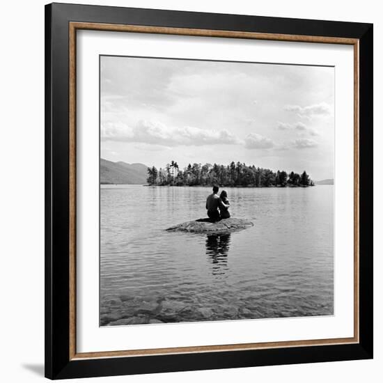 Young Couple Embracing on Small Rock Protruding from the Waters of Lake George-Nina Leen-Framed Photographic Print