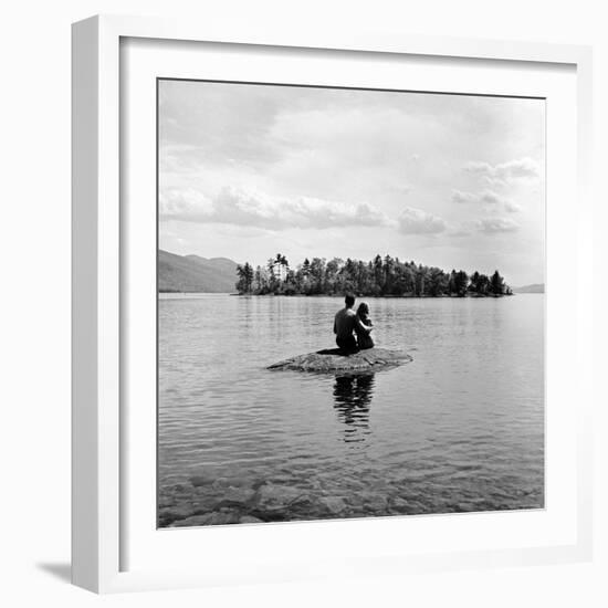 Young Couple Embracing on Small Rock Protruding from the Waters of Lake George-Nina Leen-Framed Photographic Print