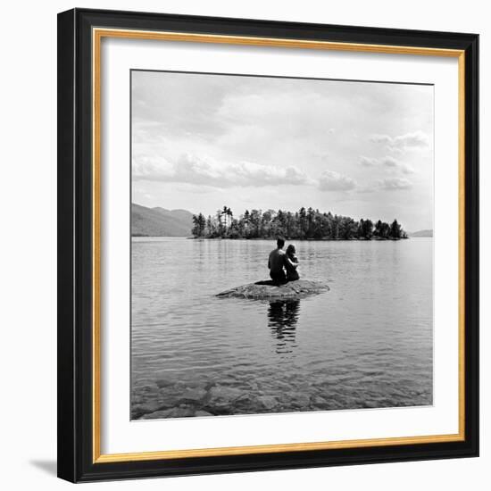 Young Couple Embracing on Small Rock Protruding from the Waters of Lake George-Nina Leen-Framed Photographic Print