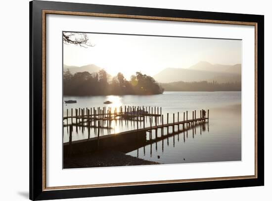 Young Couple on Pier, Sunset, Derwent Water, Cumbria, UK-Peter Adams-Framed Photographic Print