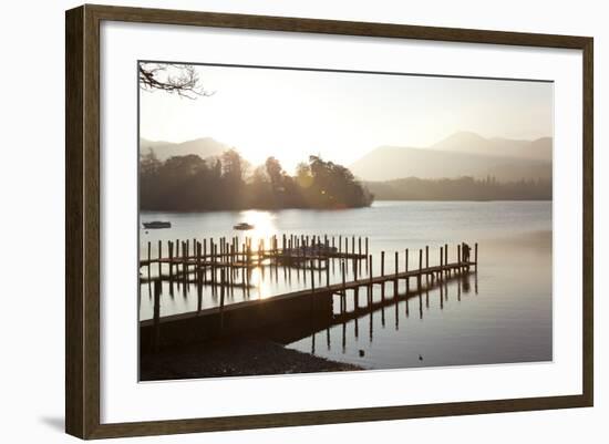 Young Couple on Pier, Sunset, Derwent Water, Cumbria, UK-Peter Adams-Framed Photographic Print