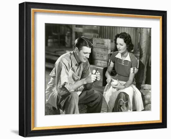 Young Couple Peeling Fruit-null-Framed Photo