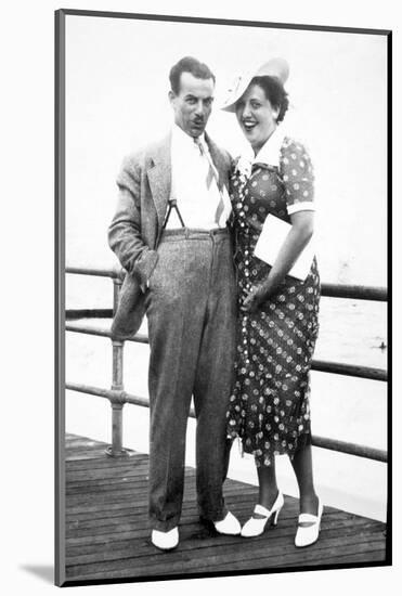 Young Couple Portrait on Boardwalk, Ca. 1929-null-Mounted Photographic Print