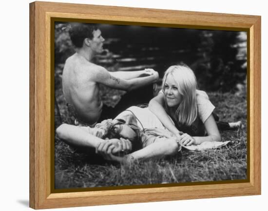 Young Couple Relaxing During Woodstock Music Festival-null-Framed Premier Image Canvas