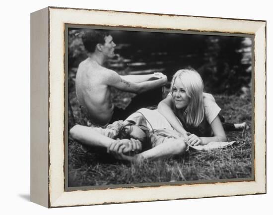 Young Couple Relaxing During Woodstock Music Festival-null-Framed Premier Image Canvas