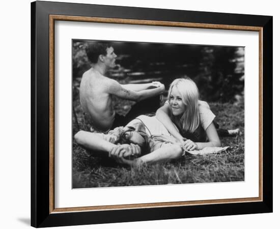 Young Couple Relaxing During Woodstock Music Festival-null-Framed Photographic Print