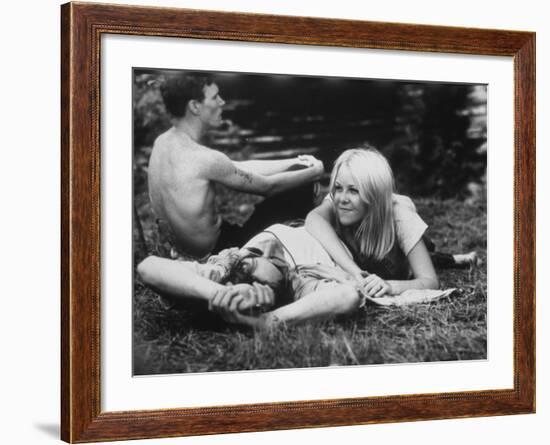 Young Couple Relaxing During Woodstock Music Festival-null-Framed Photographic Print