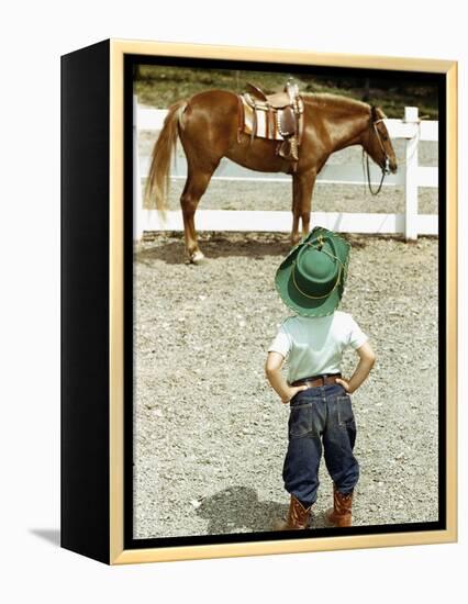 Young Cowboy Looking at Horse-William P. Gottlieb-Framed Premier Image Canvas