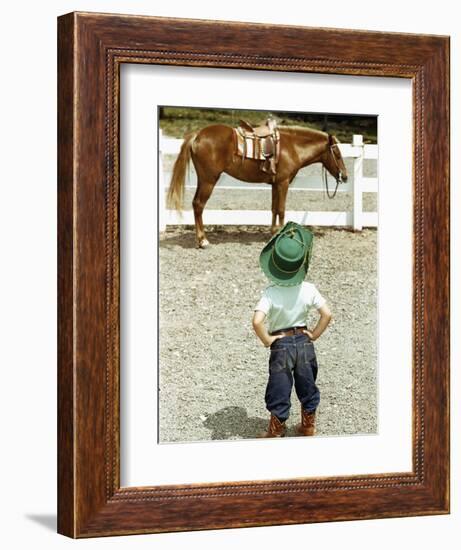 Young Cowboy Looking at Horse-William P. Gottlieb-Framed Photographic Print