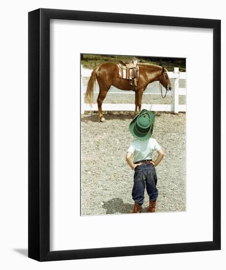 Young Cowboy Looking at Horse-William P. Gottlieb-Framed Photographic Print