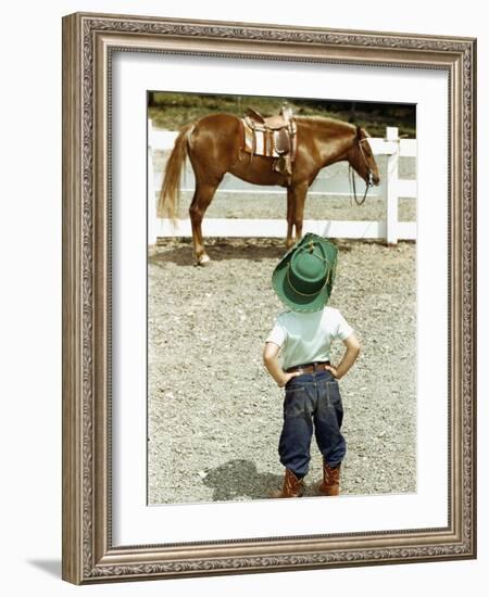 Young Cowboy Looking at Horse-William P. Gottlieb-Framed Photographic Print