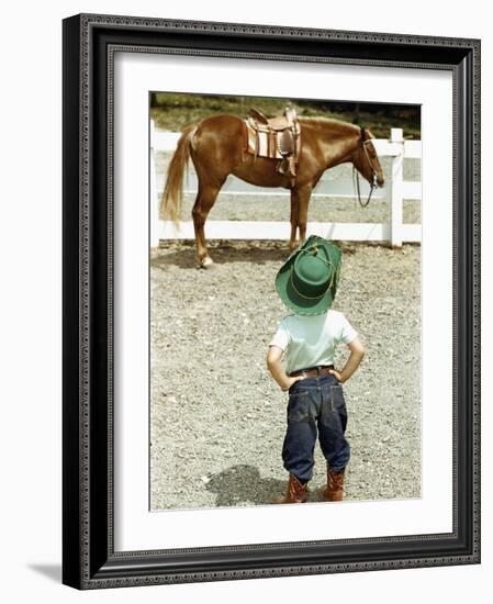 Young Cowboy Looking at Horse-William P. Gottlieb-Framed Photographic Print