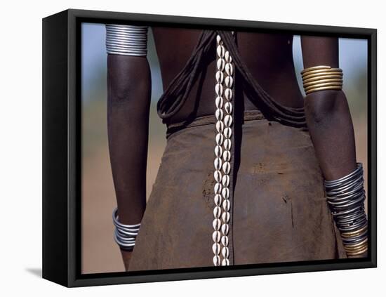 Young Dassanech Girl Wears a Leather Skirt, Metal Bracelets, Amulets and Bead Necklaces, Ethiopia-John Warburton-lee-Framed Premier Image Canvas