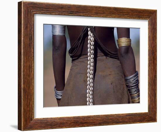 Young Dassanech Girl Wears a Leather Skirt, Metal Bracelets, Amulets and Bead Necklaces, Ethiopia-John Warburton-lee-Framed Photographic Print