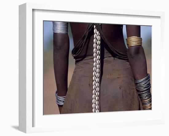 Young Dassanech Girl Wears a Leather Skirt, Metal Bracelets, Amulets and Bead Necklaces, Ethiopia-John Warburton-lee-Framed Photographic Print