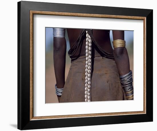 Young Dassanech Girl Wears a Leather Skirt, Metal Bracelets, Amulets and Bead Necklaces, Ethiopia-John Warburton-lee-Framed Photographic Print