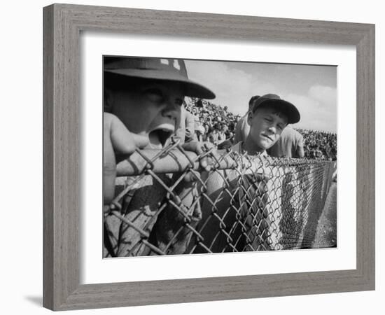 Young Fans Standing at Fence Which Borders Field at World Series Game, Braves vs. Yankees-Grey Villet-Framed Photographic Print