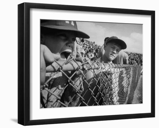 Young Fans Standing at Fence Which Borders Field at World Series Game, Braves vs. Yankees-Grey Villet-Framed Photographic Print