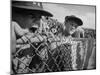 Young Fans Standing at Fence Which Borders Field at World Series Game, Braves vs. Yankees-Grey Villet-Mounted Photographic Print